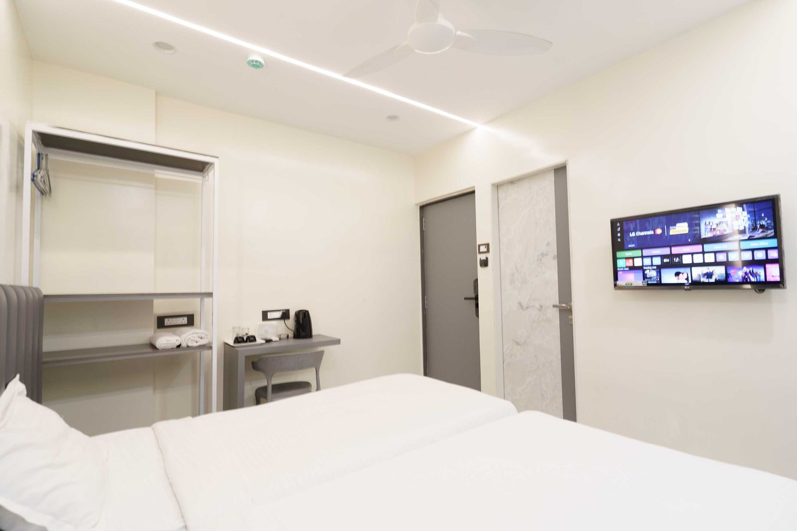 Twin bed room after the 2025 renovation — Lake Bloom Residency Powai