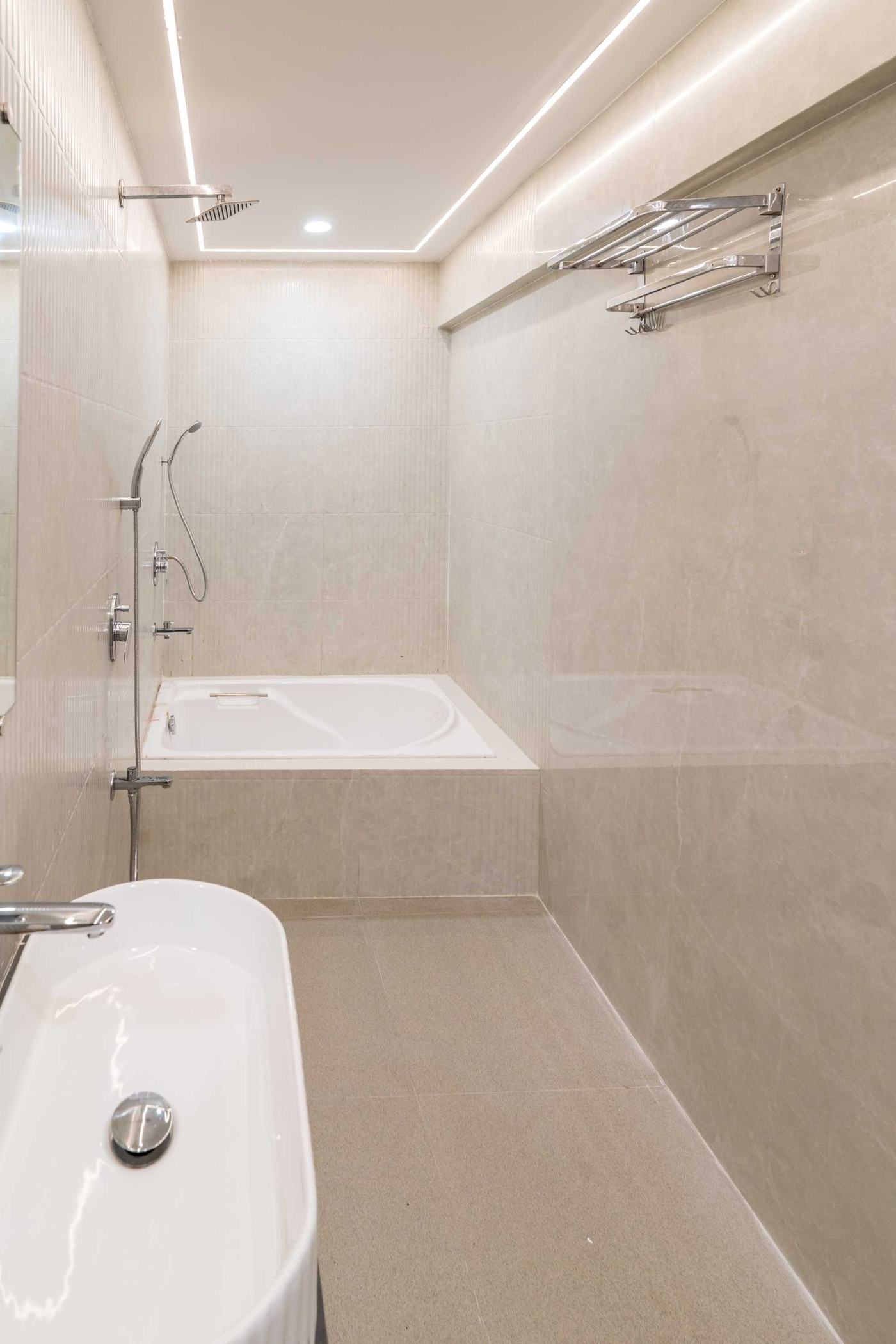 The Mahogany Soak — the bathtub — Lake Bloom Residency Powai