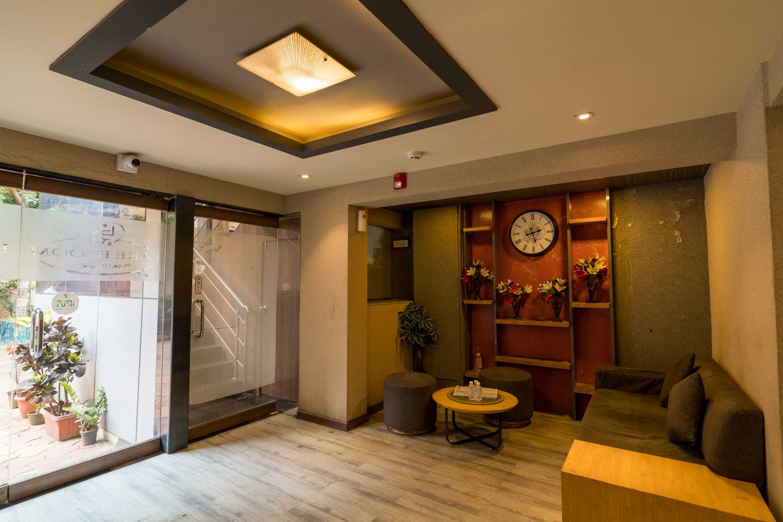 Reception lounge seating — Lake Bloom Residency Powai
